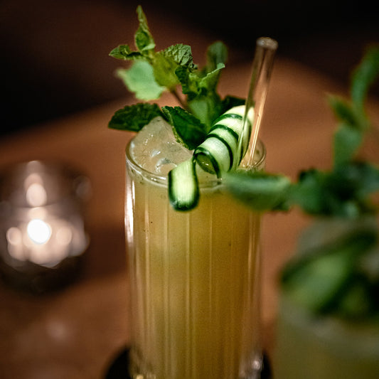 Tall cooler with cucumber ribbons and mint