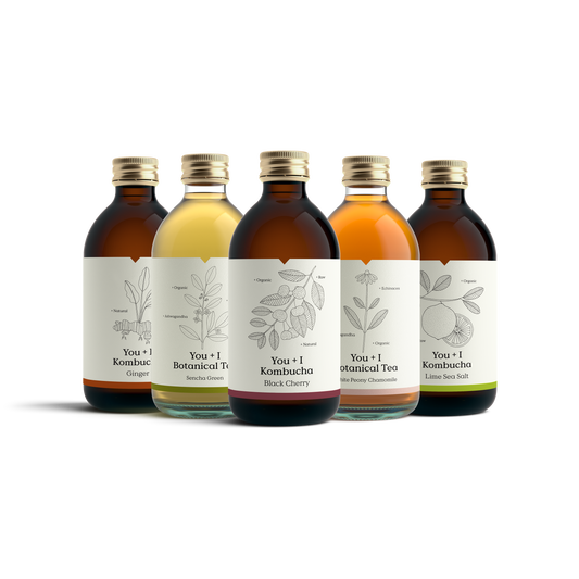 A mix of You + I kombucha and botanical tea bottles